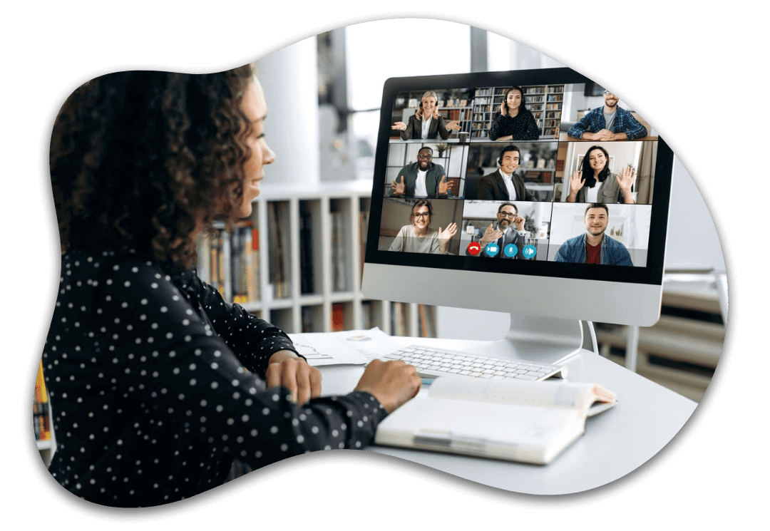 Woman participating in online video conference meeting.