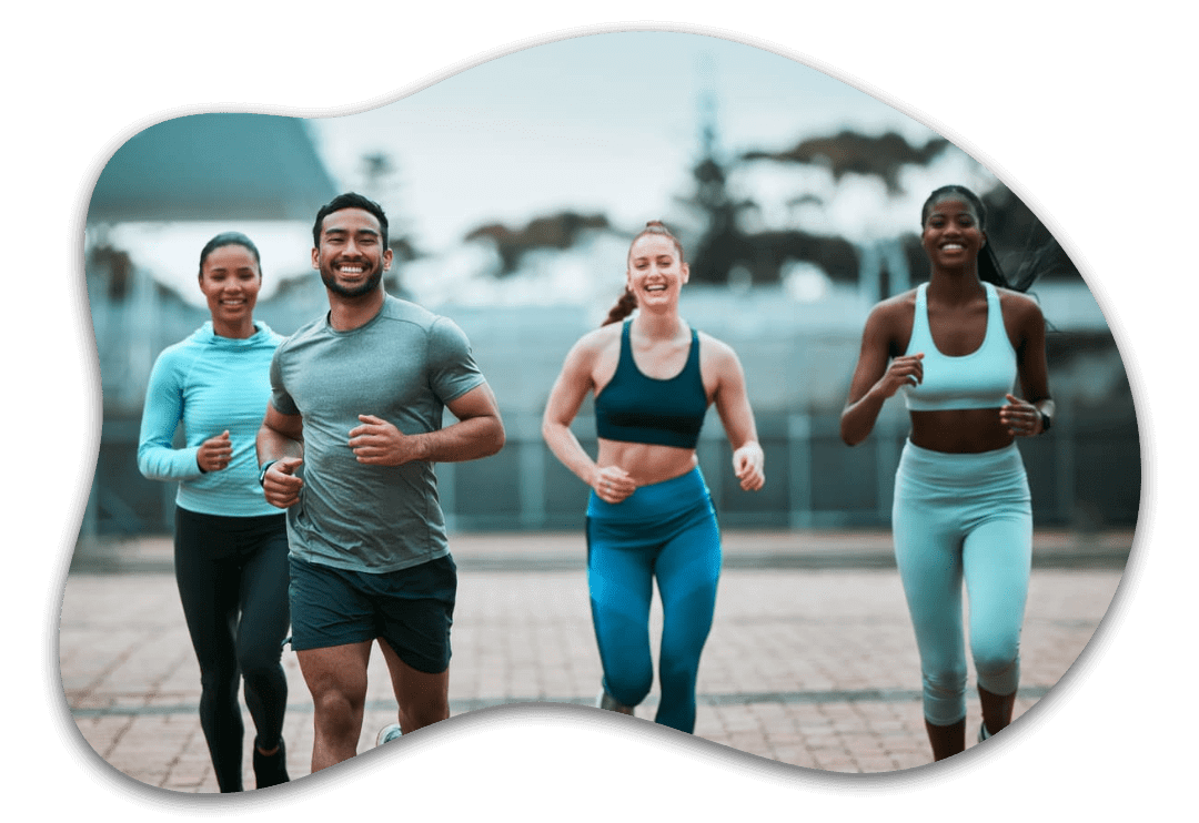 Group of people jogging outdoors together.